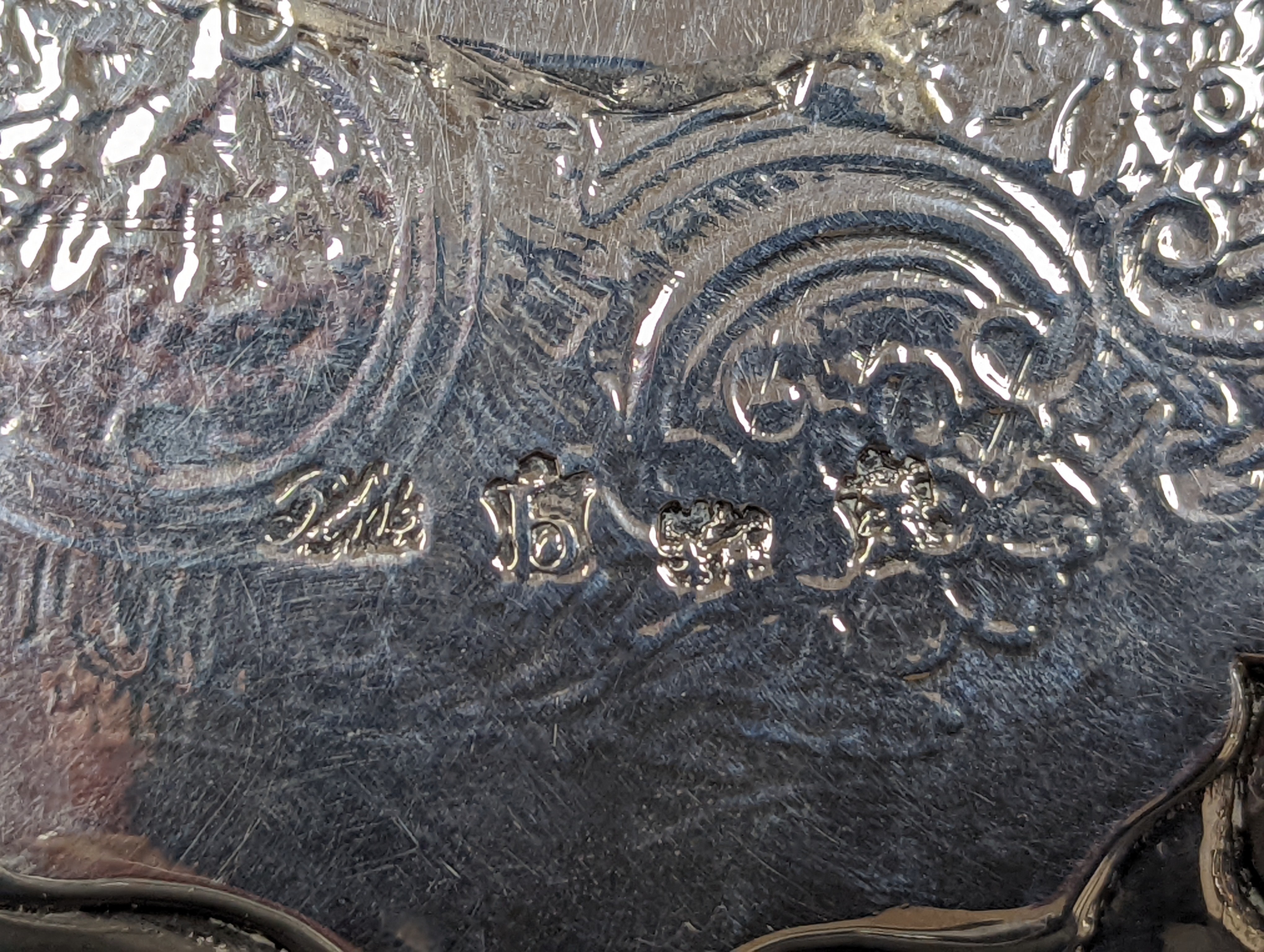 A George II silver waiter, with later engraved decoration, William Grundy, London, 1751, 18.6cm, 8oz (a.f.).